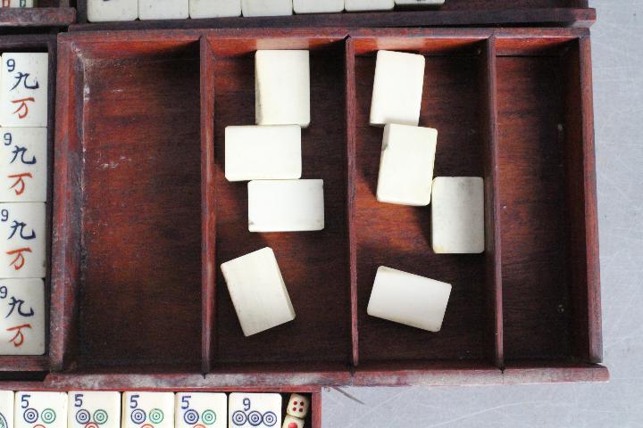 A vintage Mahjong set, wooden case with five drawers housing bone and bamboo tiles, - Image 15 of 16