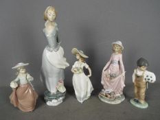 Lladro - Two unboxed figurines by Lladro comprising # 4922 Sea Breeze, # 5027 Flowers In The Basket,