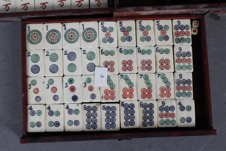 A vintage Mahjong set, wooden case with five drawers housing bone and bamboo tiles, - Image 11 of 16