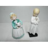 Two Royal Doulton figurines entitled Bedtime and Stayed at Home,