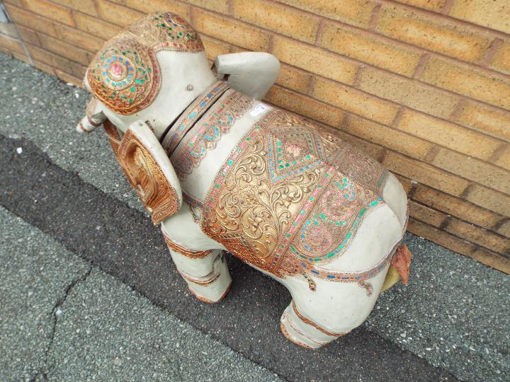 A Burmese ornately decorated articulated wooden elephant, from the Mandalay Puppet Theatre, - Image 5 of 7