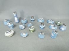 Tobacciana - A collection of Wedgwood and similar jasperware table lighters.