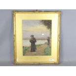 A framed watercolour depicting a pair of holy men walking a coastal path and reading,