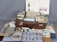 A large quantity of cigarette cards, loose and contained in albums including complete sets,