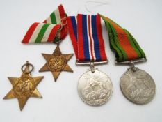 A World War Two (WWII / WW2) medal group comprising two War Medal,