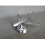 Tobacciana - A Dunhill Jet Plane chrome plated table lighter, based on the F-86 Sabre plane,