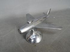 Tobacciana - A Dunhill Jet Plane chrome plated table lighter, based on the F-86 Sabre plane,