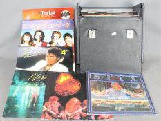Approximately fifty 12" vinyl records to include Meat Loaf, Styx, Prefab Sprout, Poison,