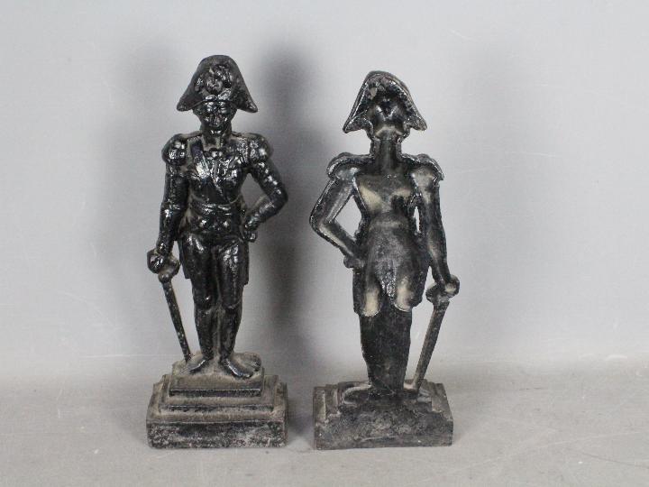 A pair of early 20th century cast iron door stops in the form of Napoleonic soldiers on stepped - Image 2 of 2