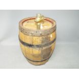 A small coopered barrel with brass tap, marked Mather Leeds,