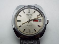 A gentleman's Delvina Geneve automatic wristwatch with baton hour markers and day / date aperture