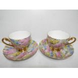 A pair of Shelley ceramic cup and saucers.