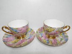 A pair of Shelley ceramic cup and saucers.