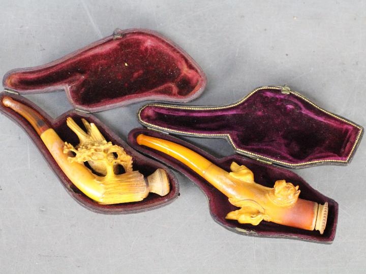 Tobacciana - Two meerschaum cheroot holders contained in fitted cases,