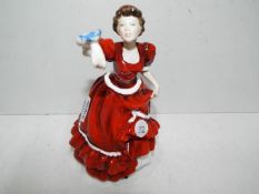 a Royal Doulton figurine entitled Pauline,