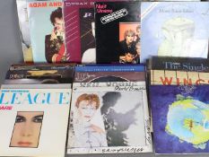 A quantity of 12" vinyl records to include Adam And The Ants, Duran Duran, Cat Stevens, Elton John,