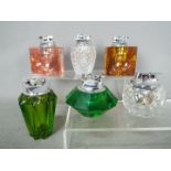 Tobacciana - Six glass table lighters of varying design, clear glass and coloured glass.