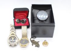 A small mixed lot to include watches, thimbles, small model depicting the Loch Ness monster,