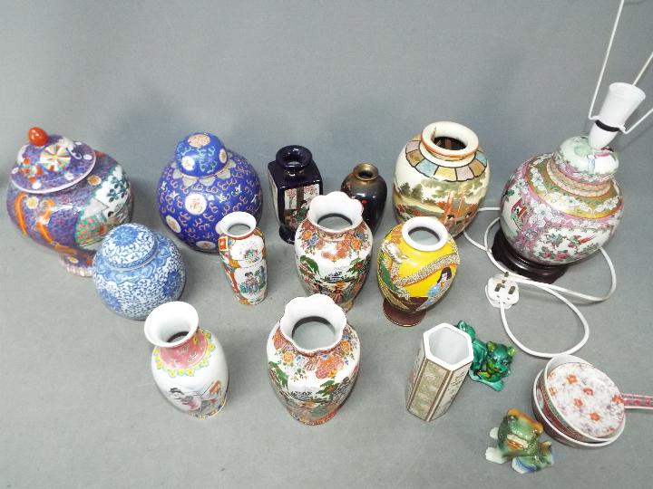 A group of Oriental ceramics to include ginger jars, vases and similar.