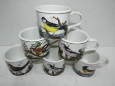 six ceramic Portmeirion mugs depicting birds,