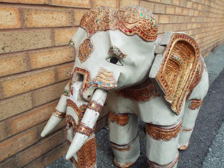A Burmese ornately decorated articulated wooden elephant, from the Mandalay Puppet Theatre, - Image 2 of 7
