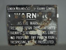 A vintage LMS Trespass Warning sign, approximately 46 cm x 56 cm.