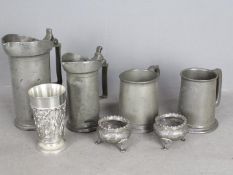 A small collection of pewter to include two antique French lidded tankards / measures (litre and