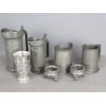 A small collection of pewter to include two antique French lidded tankards / measures (litre and