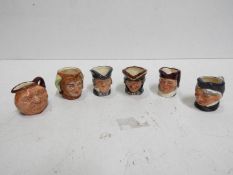 Six Royal Doulton Toby jugs, approx 4 cm