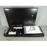 A JVC 26" television, Humax Freeview box