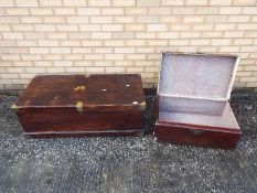 A large trunk with brass bound corners, approximately 37 cm x 110 cm x 52 cm and one other.