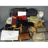 Lady's handbags, purses and similar.