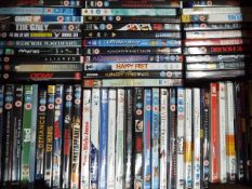 Approximately 65 movie DVDs to include 12 Years a Slave, Bad Teacher, Angels & Demons, Gravity,