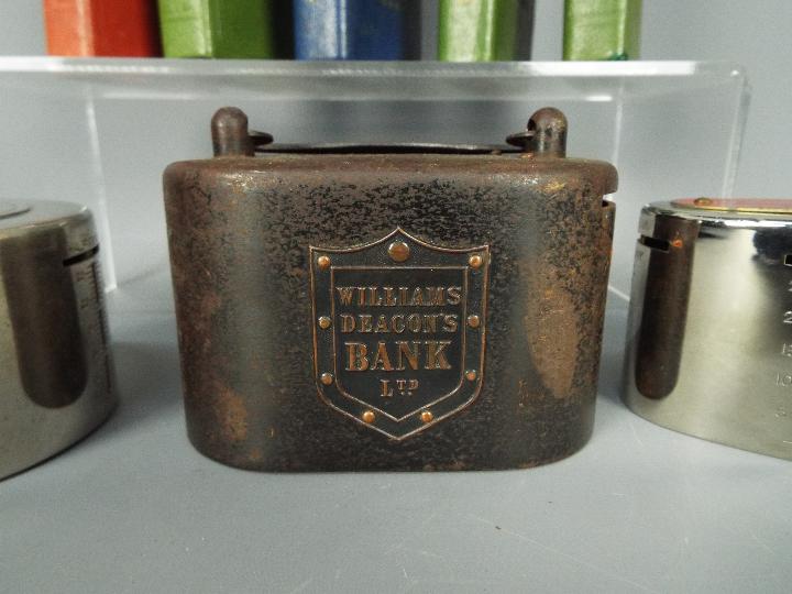 Eight vintage savings money banks comprising a Williams Deacon's Bank Ltd money box with handle, - Image 4 of 5