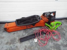 A Flymo Garden Vac and an electric hedge trimmer.