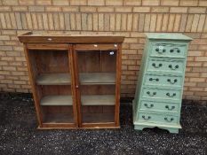 A pine, twin glazed door bookcase or display cabinet,