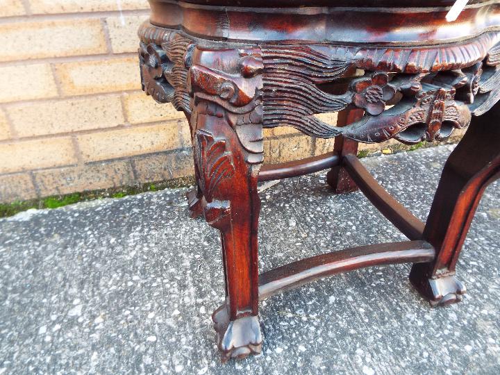 A Chinese, hardwood jardiniere stand with carved detailing and inset marble top, - Image 3 of 4