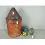 Motoring - A large vintage oil can,