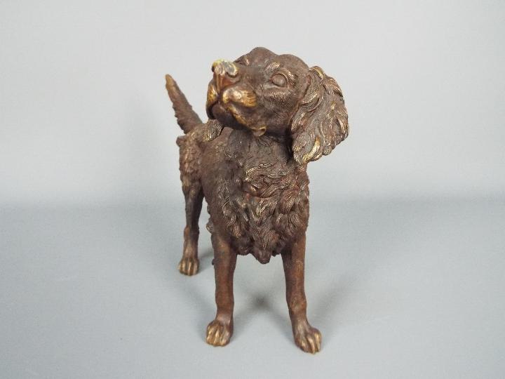 A cast metal, bronzed model of a Springer Spaniel, approximately 19 cm (h). - Image 2 of 4