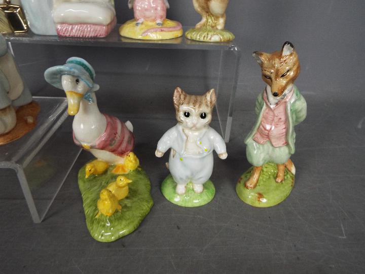 Beswick - A collection of ten Beatrix Potter figurines to include Tom Kitten, - Image 3 of 5