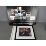 Clint Eastwood - A signed photograph, mounted and framed under glass,