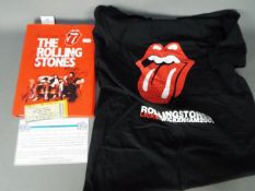 LOT WITHDRAWN - A signed copy of According To The Rolling Stones,