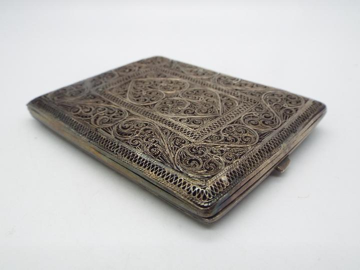 An attractive, white metal, filigree cigarette case 9.5 cm x 7.5 cm, 138 grams all in. - Image 3 of 4