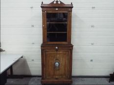 A good quality display cabinet over single door cupboard, inlaid decoration,
