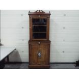 A good quality display cabinet over single door cupboard, inlaid decoration,