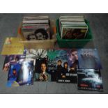 Two boxes of 12" vinyl records to include Erasure, Status Quo, Wet Wet Wet, The Monkees,