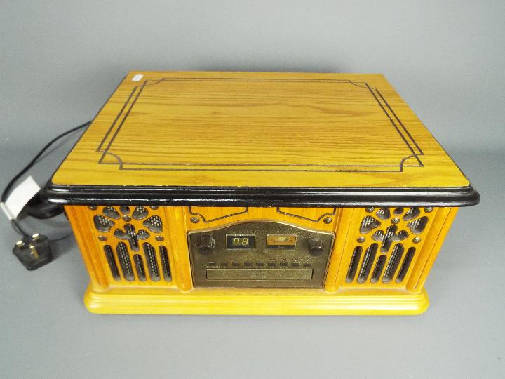 An antique style music system with radio, CD player and vinyl turntable. - Image 3 of 3