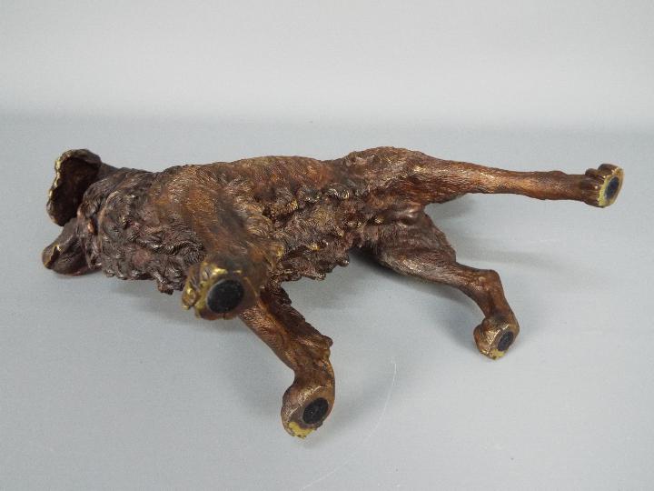 A cast metal, bronzed model of a Springer Spaniel, approximately 19 cm (h). - Image 4 of 4