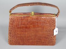 A 20th century crocodile skin handbag.