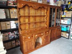 A pine kitchen dresser, approximately 199 cm x 152 cm x 47 cm.